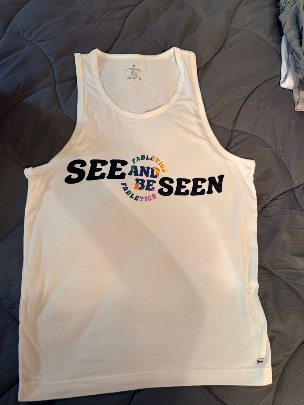 Fabletics Men's White Tank with Black and Rainbow 'SEE AND BE SEEN' Print